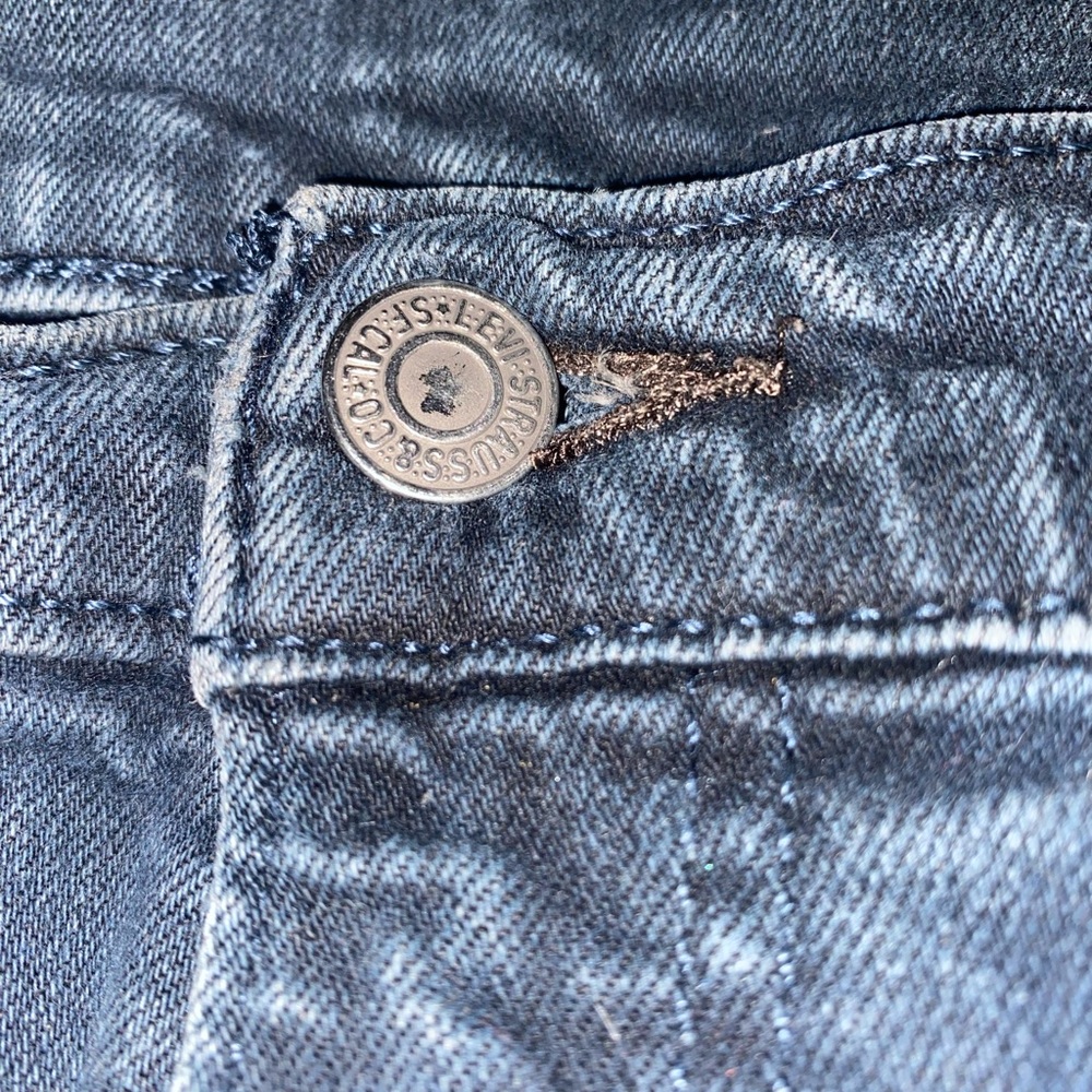 Levi’s 502 dark blue jeans